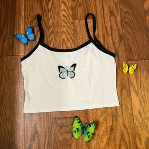 Black piped butterfly crop top.